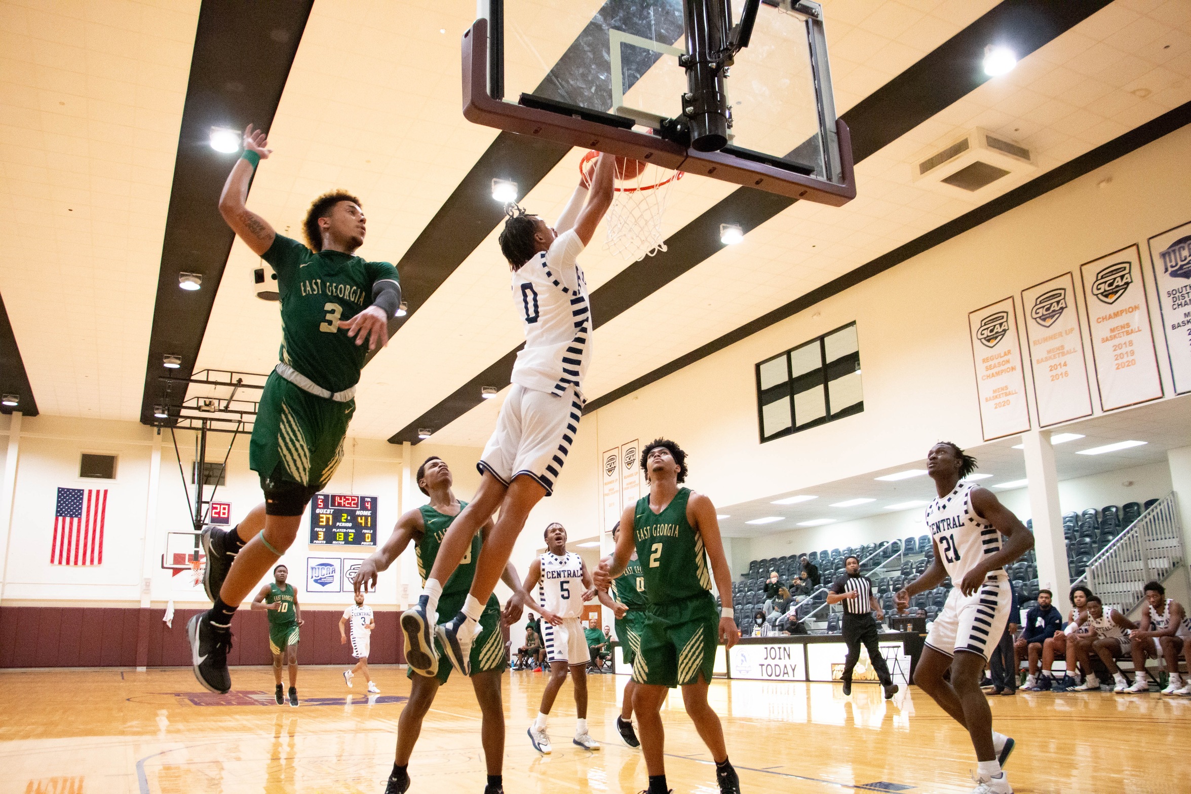 Almamy Drame with a dunk over East Georgia State defenders