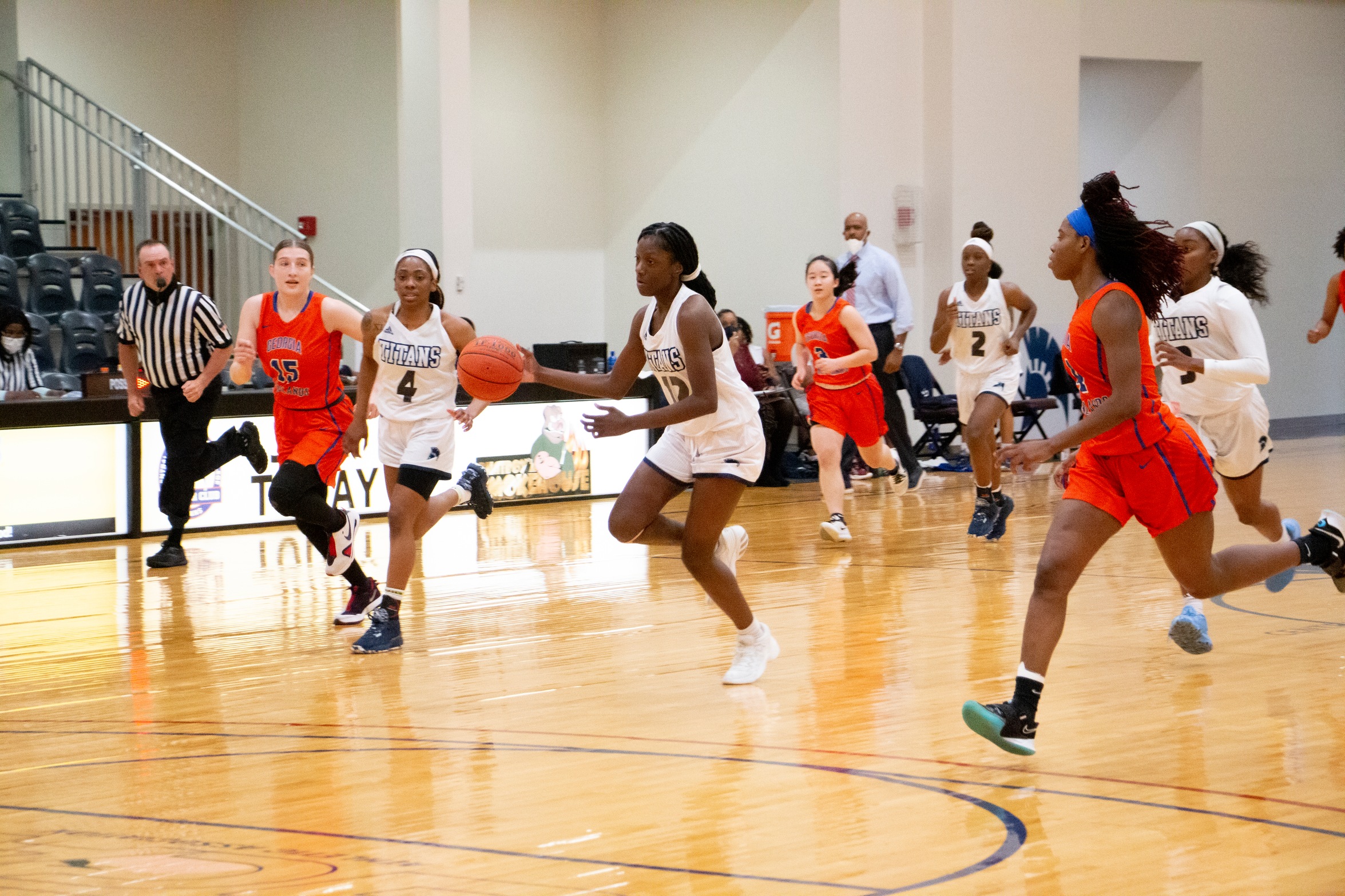 Juanisha Black leading the fast break at mid-court